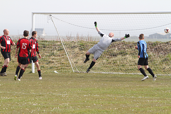 Bruce Pinkerton's header hits the back of the net to give Rendall a resounding 3-0 lead over Stenness going into the second leg.