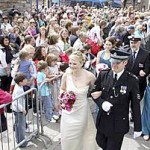 Shopping Week Queen Lara Hourie is escorted to the Town House by Sergeant Gordon Deans (The Orcadian/Orkney Media Group)