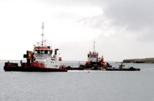 Concrete structure deployment off barrier