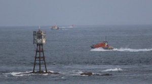 Major air and sea search area widens