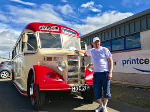 Vintage coach rolls through town