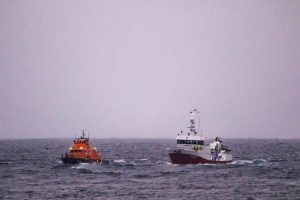 Stromness Lifeboat tows in fish carrier caught in fishing gear