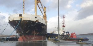 Cargo ship back alongside at Lyness
