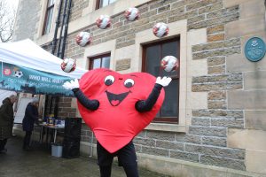 Keepie uppie in Kirkwall — BID members take on Red Nose Day challenge
