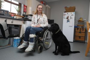 Holm woman hails life-changing canine companion