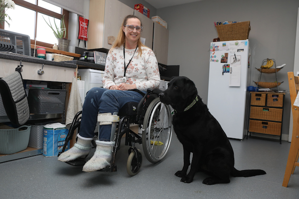 Holm woman hails life-changing canine companion