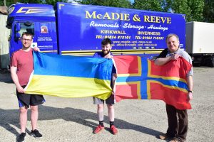 Orkney men unload Ukraine donations after mammoth journey to Romania