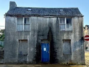 Demolition denied for derelict town house