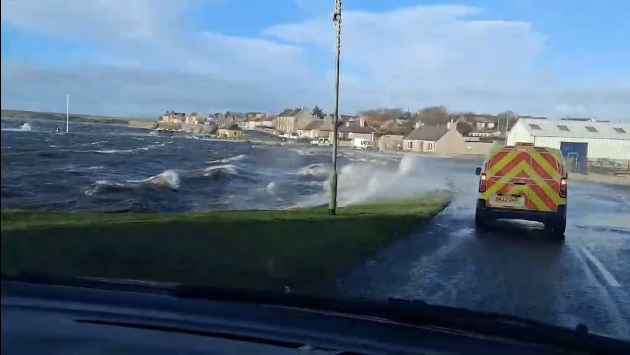 Barriers shut and flood warning as gales surge across Orkney
